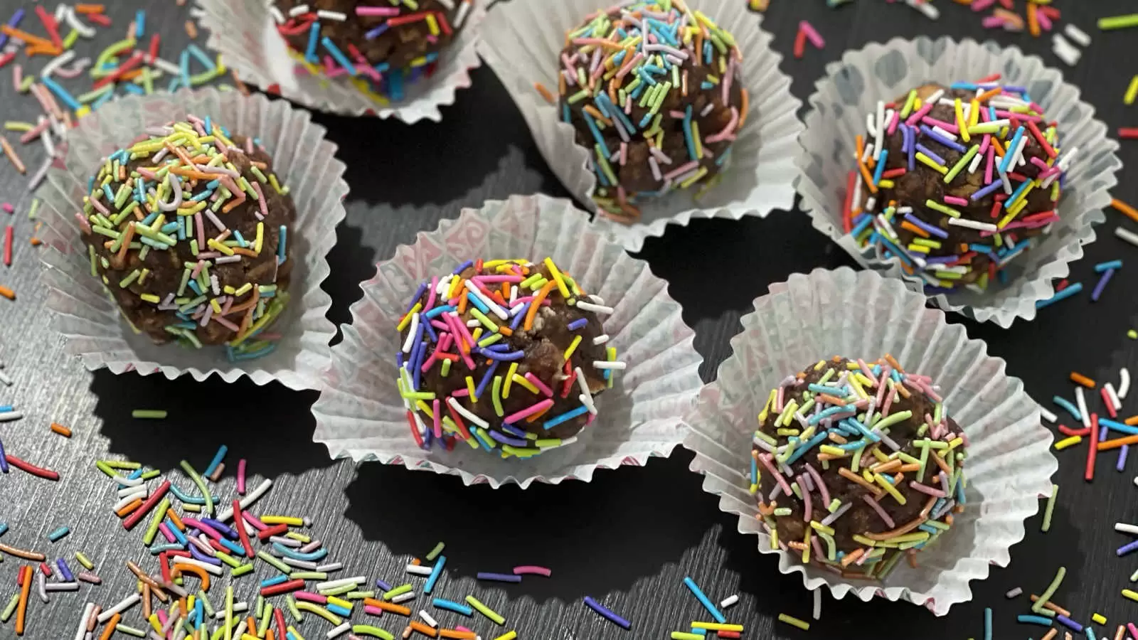 Easy Chocolate balls with rainbow sprinkles in baking cups