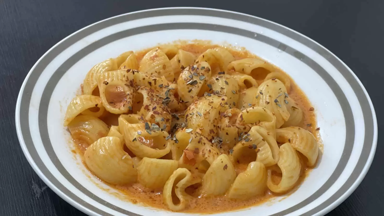 Creamy Tomato Pasta dish in a plate on a table