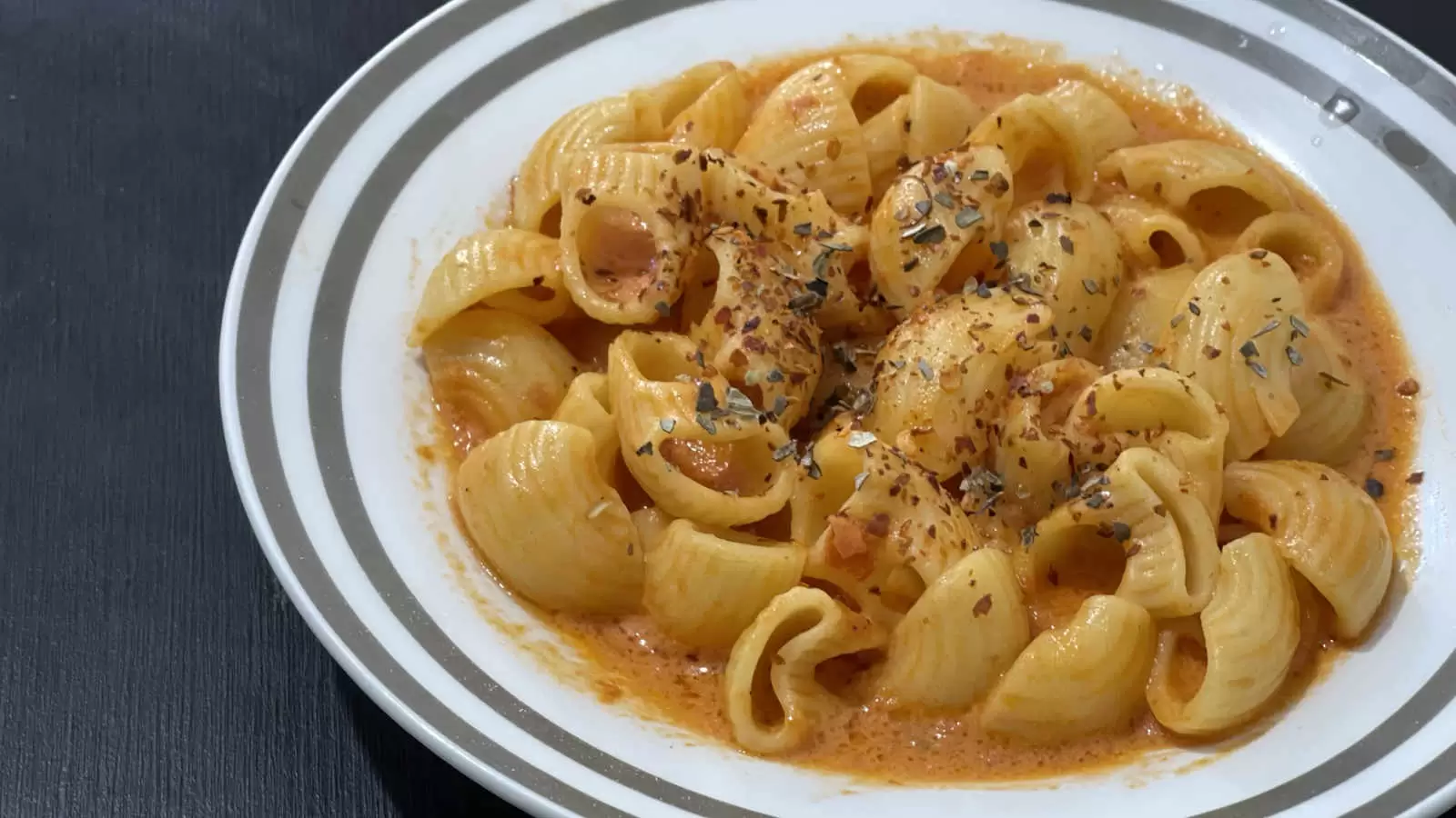 Creamy Tomato Pasta meal in a plate on a table