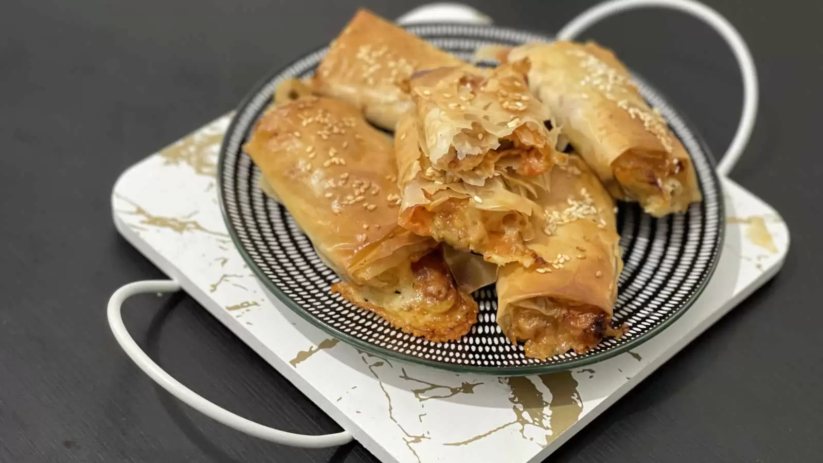 Filo Pastry Pizza on a plate on a white gold tray