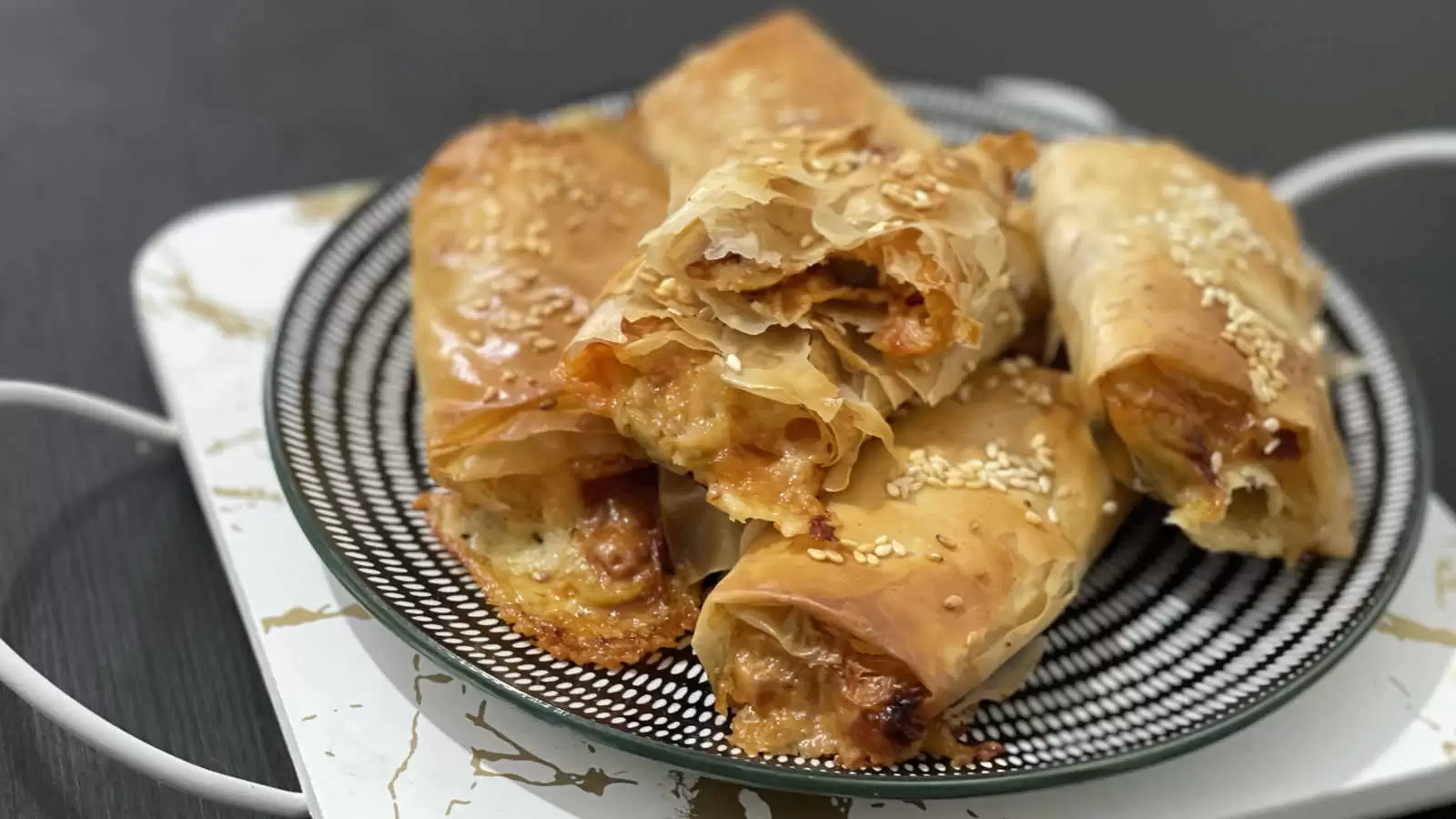 Filo Pastry Pizza on a plate on a white gold tray