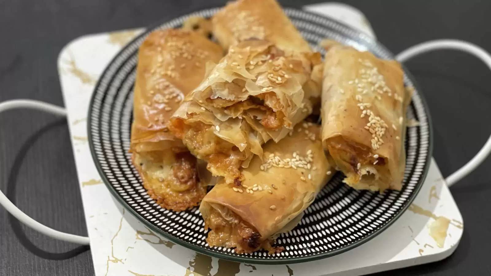 Filo Pastry Pizza recipe on a plate on a white gold tray