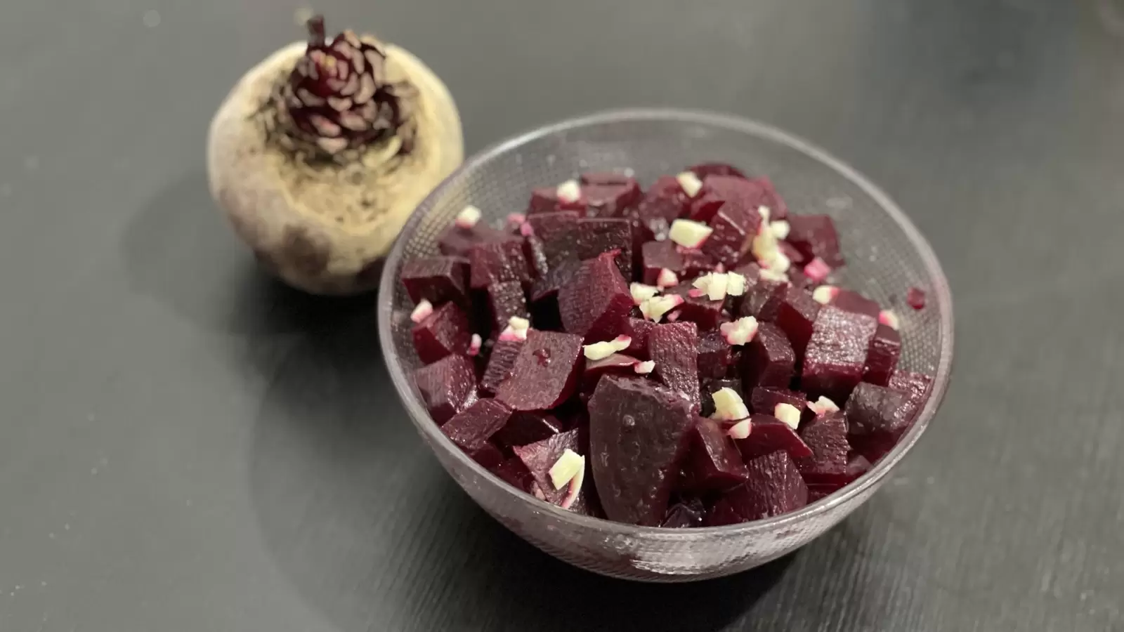 Homemade Beets Beets in a bowl next to beets on a table