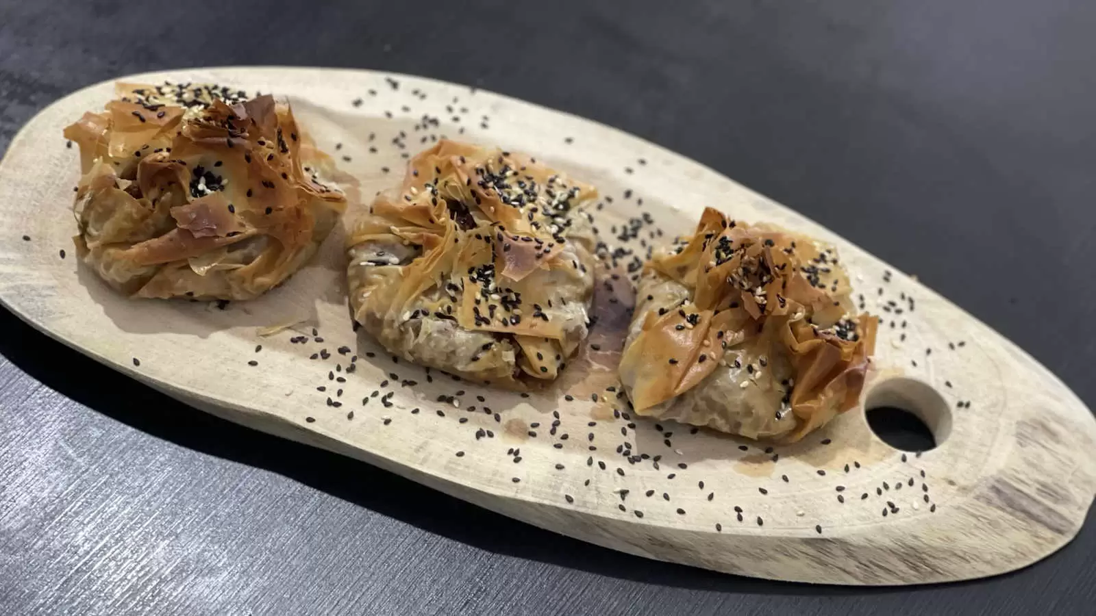 Phyllo Dough Beef Pie Recipe on a wooden board