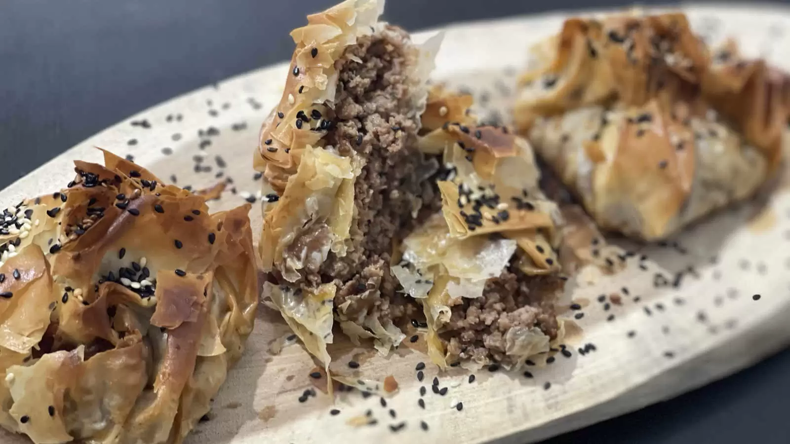 Phyllo Dough Beef Pie on a wooden board