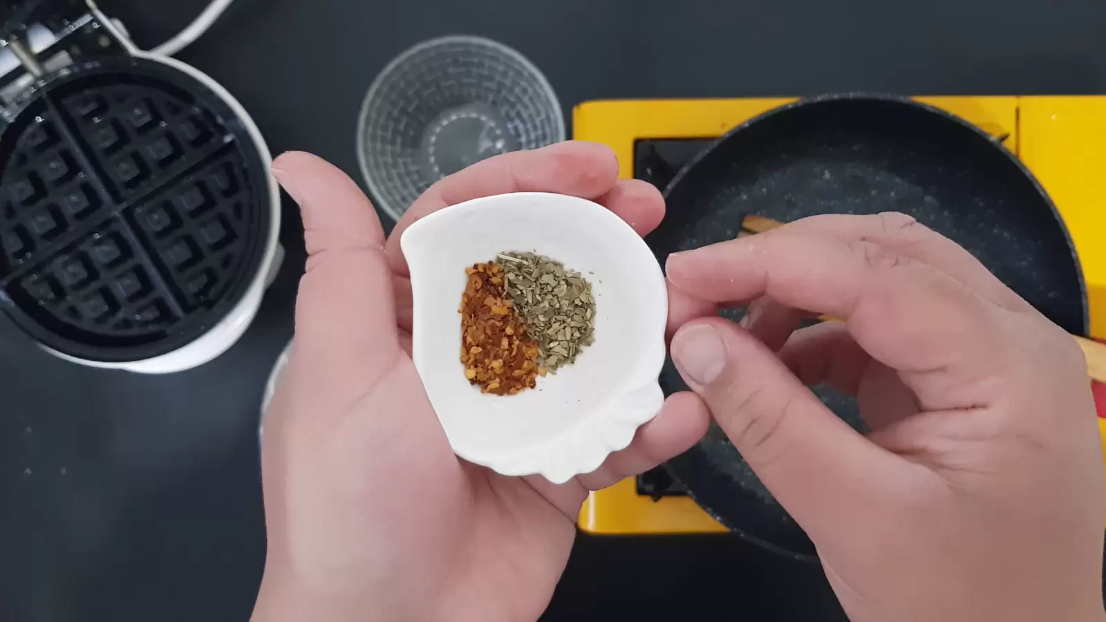 Oregano and chili spices in a bowl