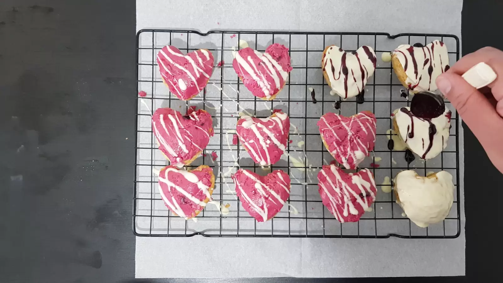 Vanilla cupcakes, spoon, cooling rack, baking paper