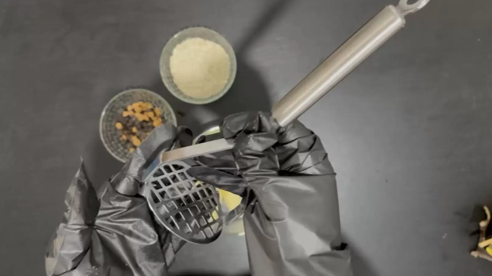 potato masher, bowl of oats, bowl of chocolate chips