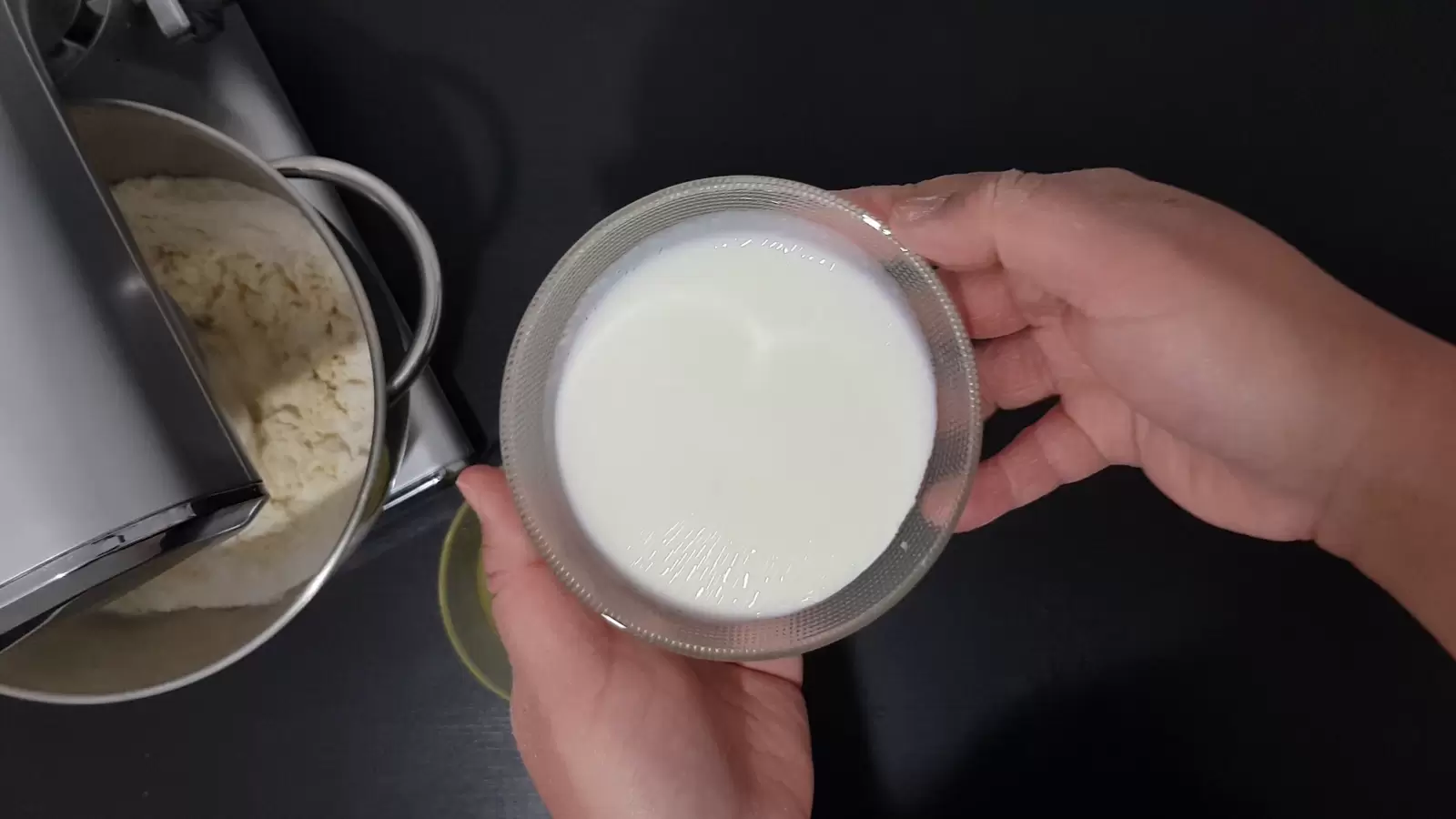 Mixer with mixture, bowl with milk