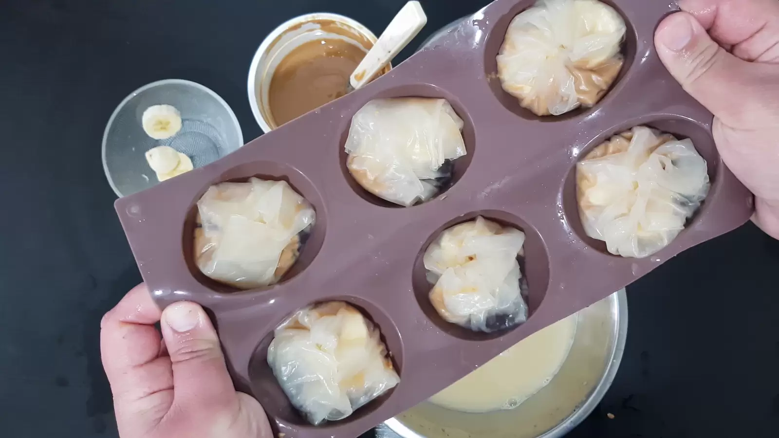 Muffin tin with Peanut Butter Chocolate and Banana Rice Paper Pastries