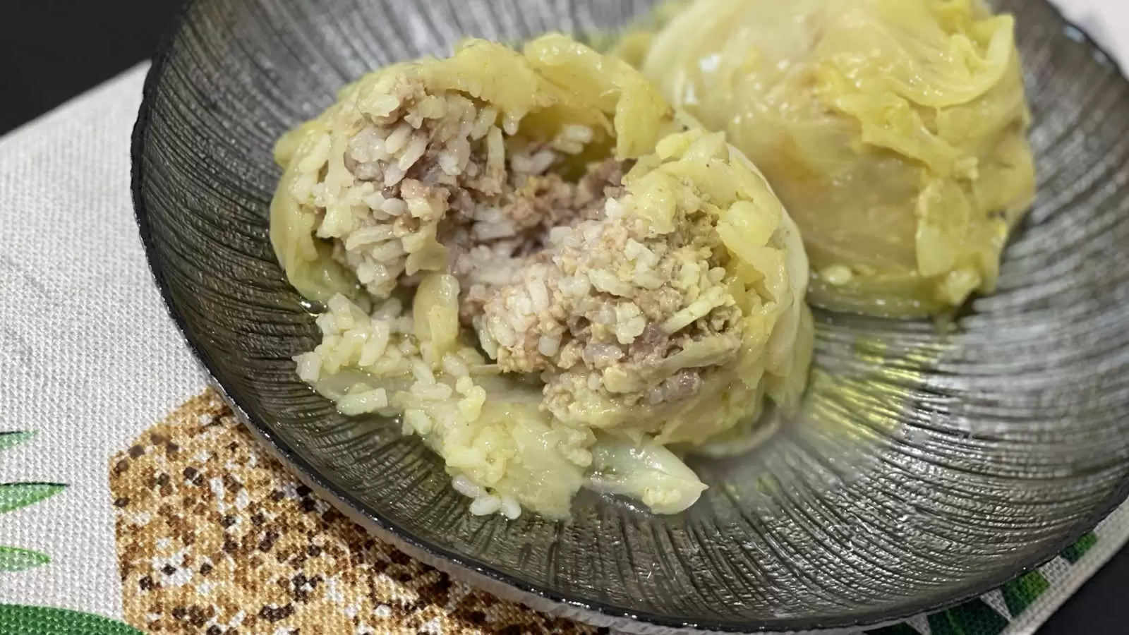 Stuffed Cabbage With Beef And Rice meal a plate with the dish a napkin underneath