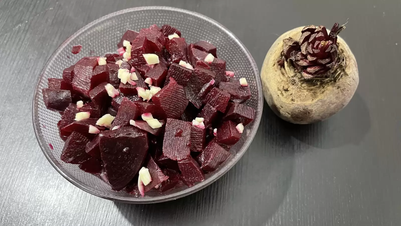 Tasty Beets Beets in a bowl next to beets on a table