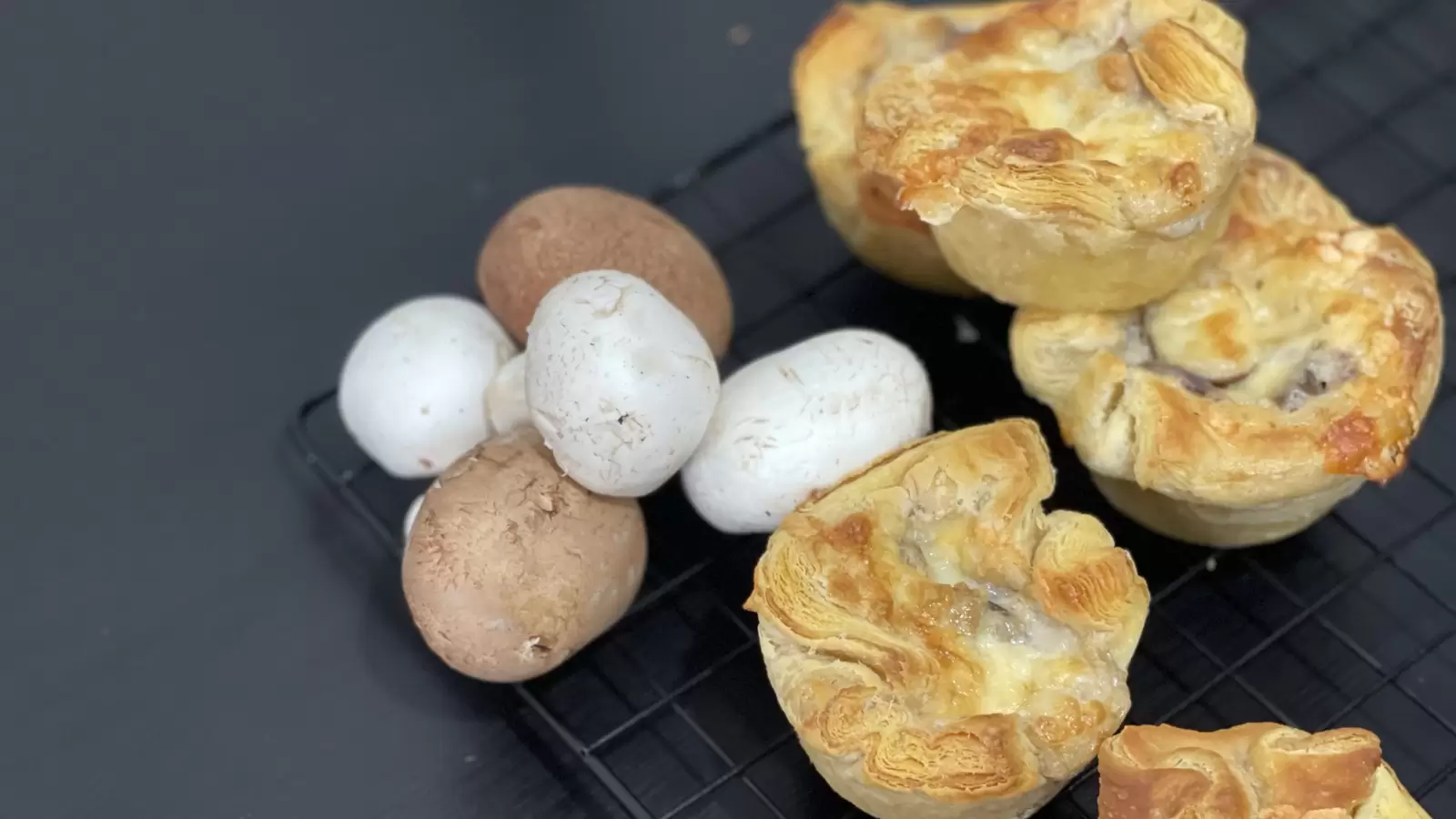 Tasty Mushroom and Caramelized Onion Puff Pastry Tart on cooling rack