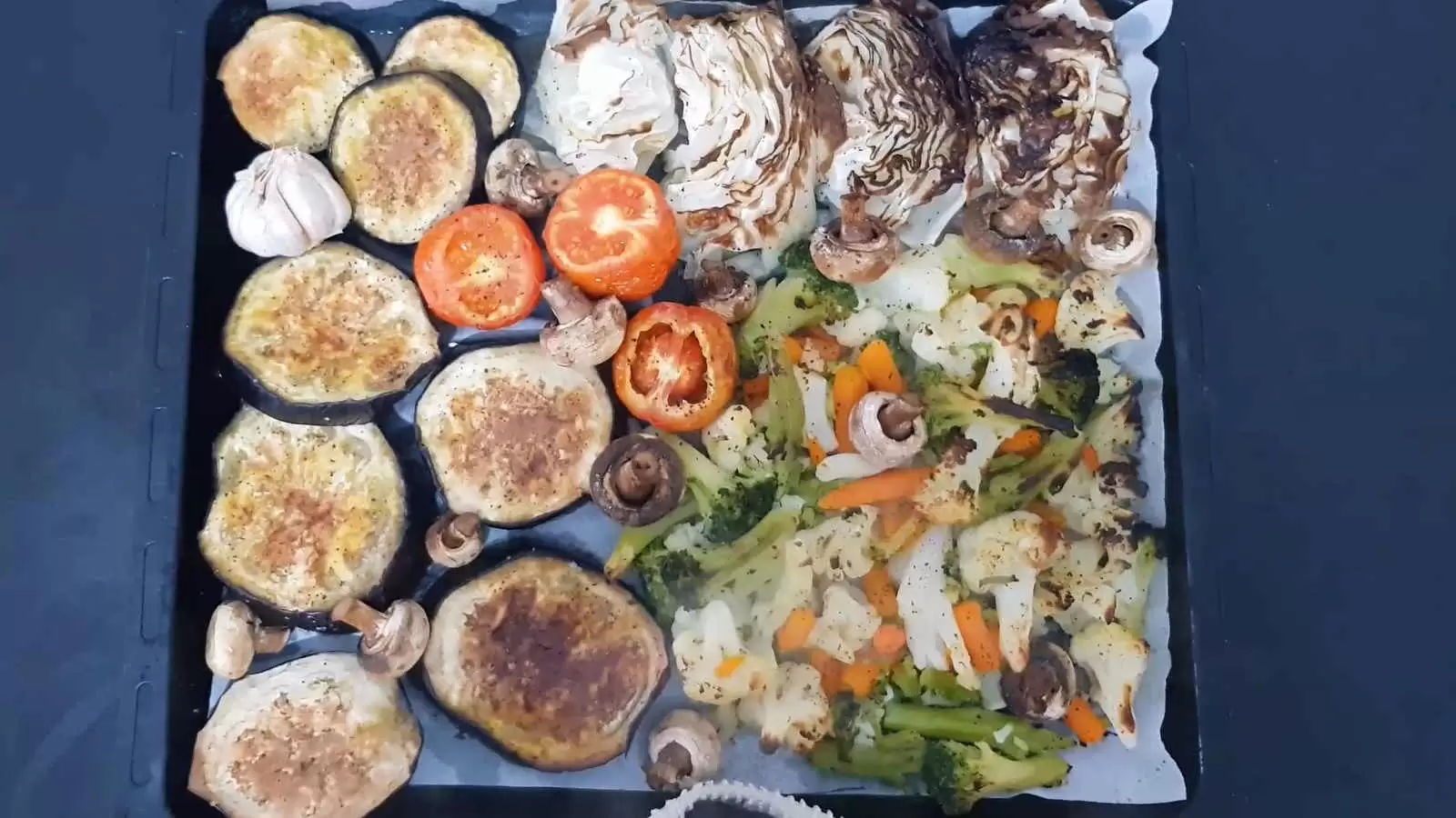 The roasted vegetables on a tray