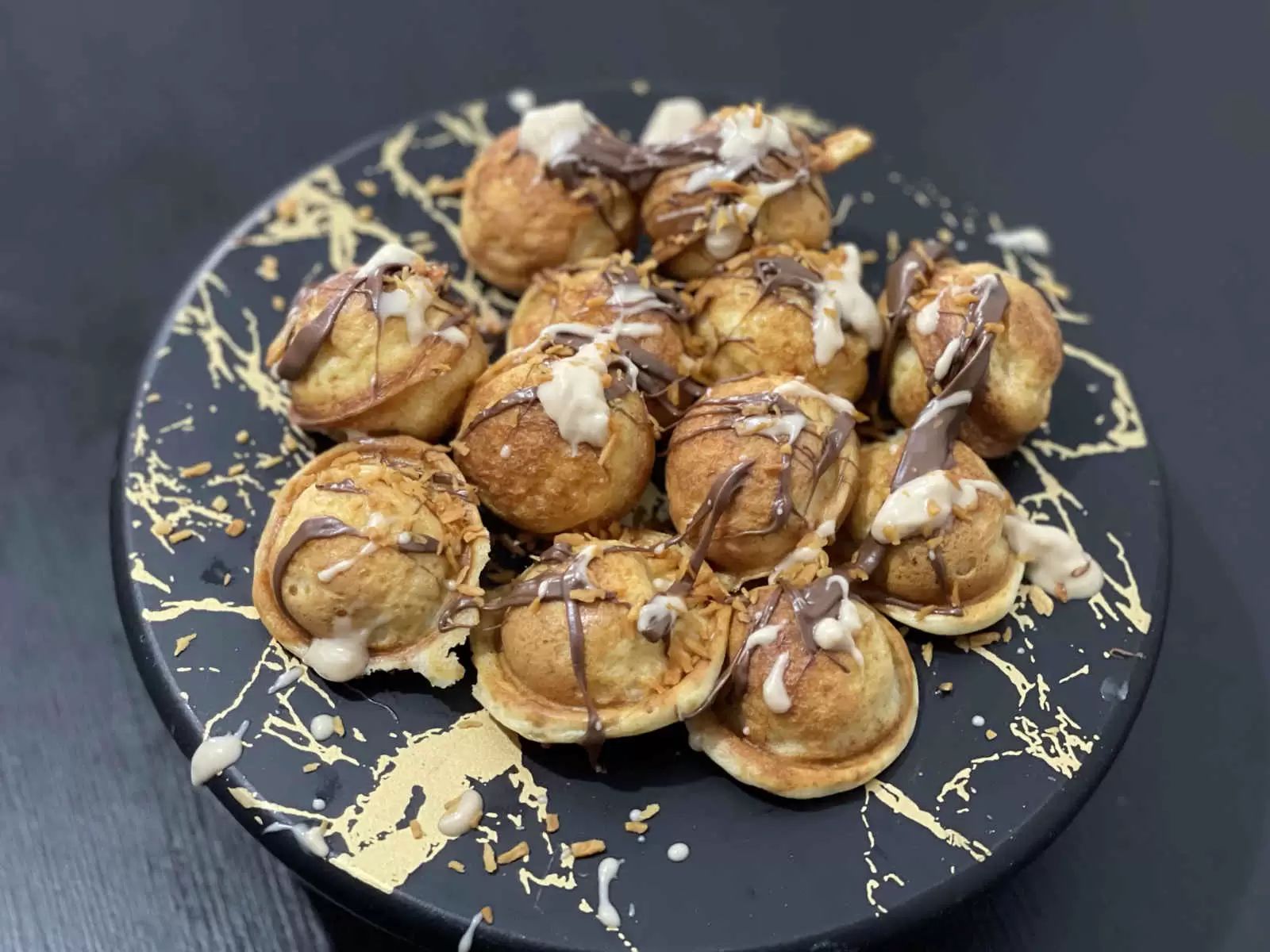 Tasty pancake balls with nutella and kinder bueno